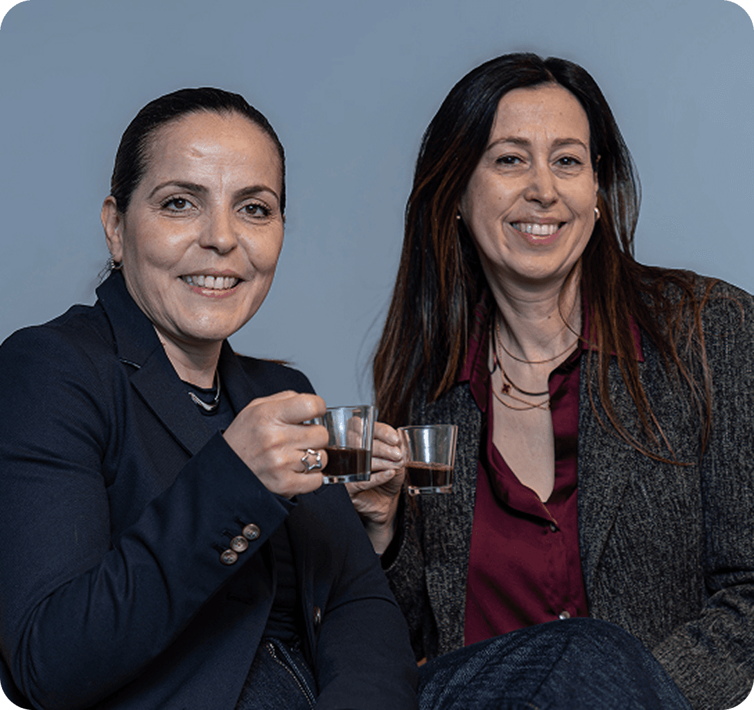 Aptean team members smiling together at a company event