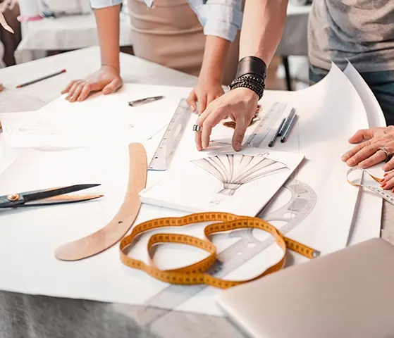 Clothing designers creating new collection