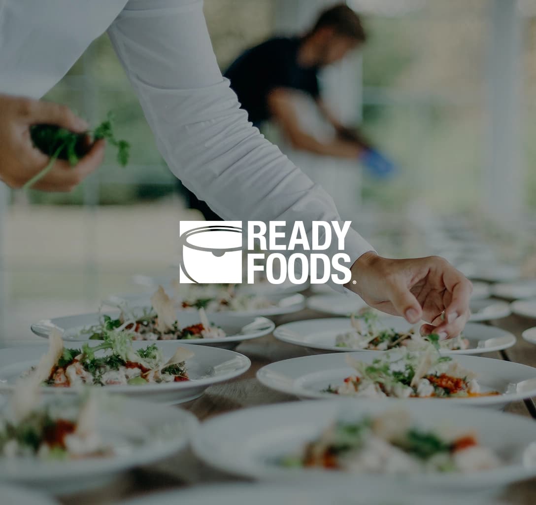 Ready Foods logo featuring a chef plating up food on plates